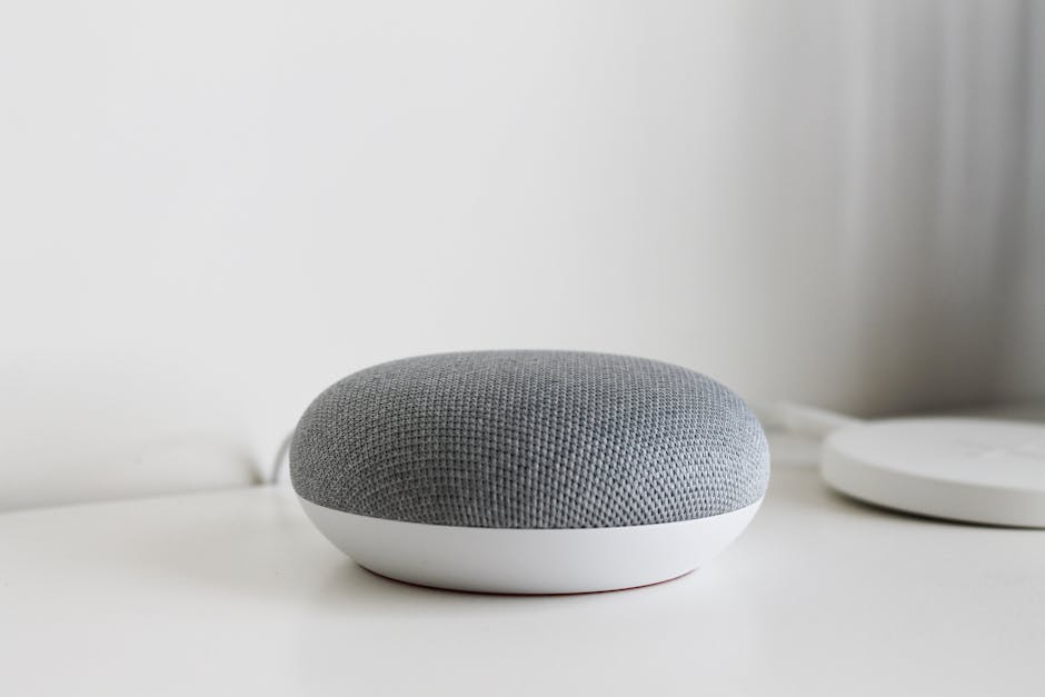 Smart speaker representing AI assistant technology and voice-driven deep linking