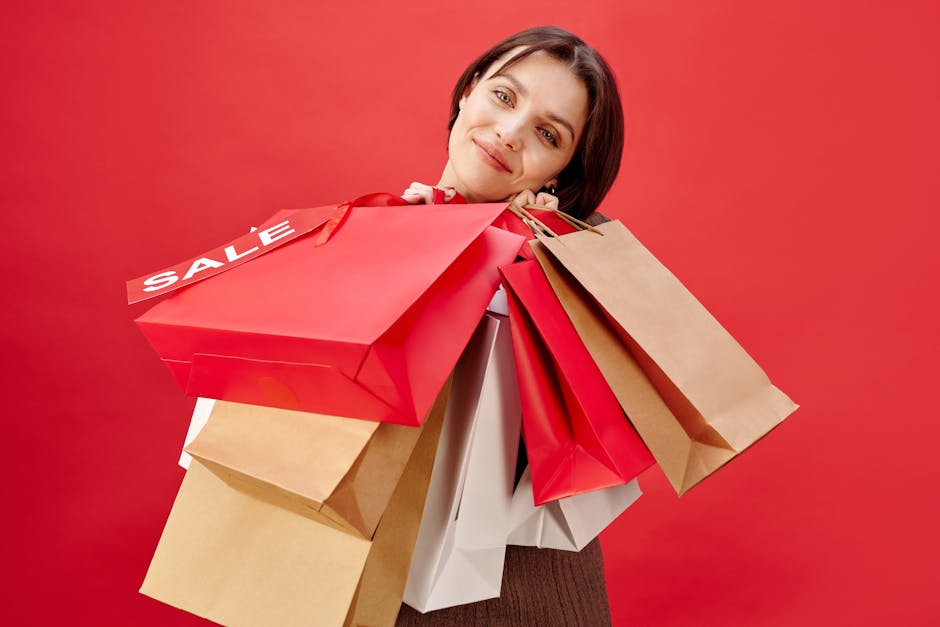 Excited shopper holding shopping bags during a flash sale