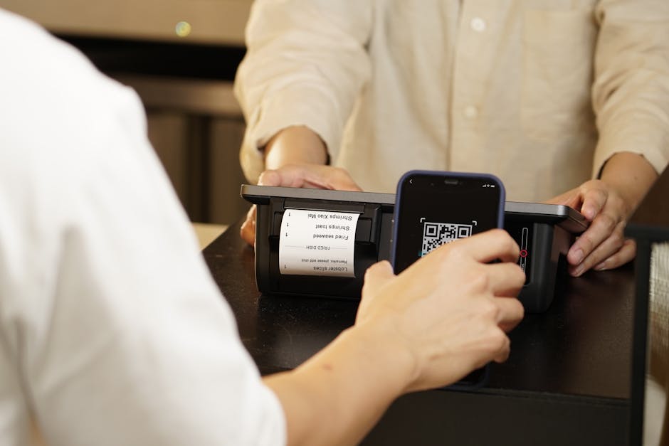 Customer scanning a QR code at a retail counter for in-store to app purchase