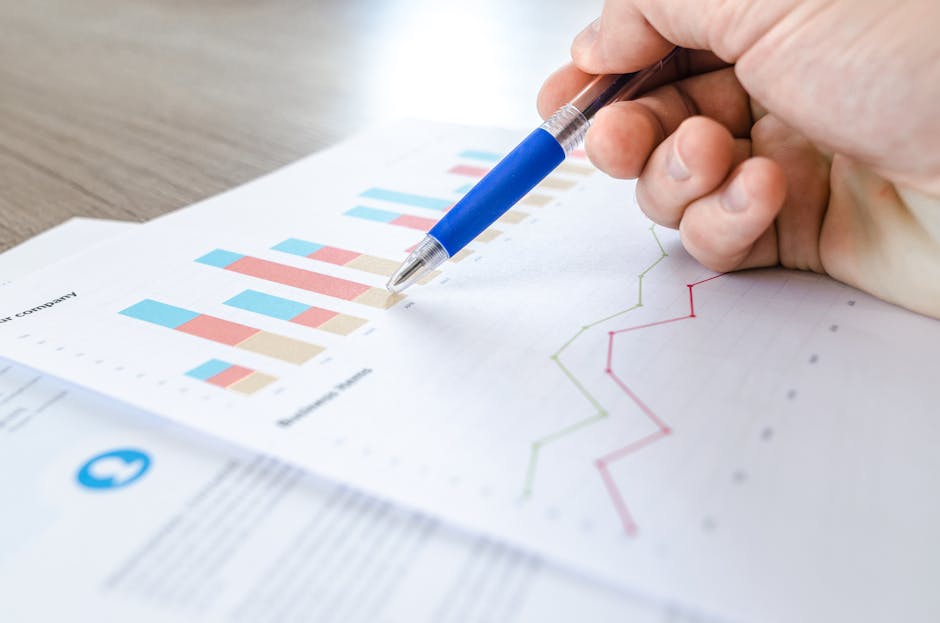Analyzing marketing campaign performance data on printed charts